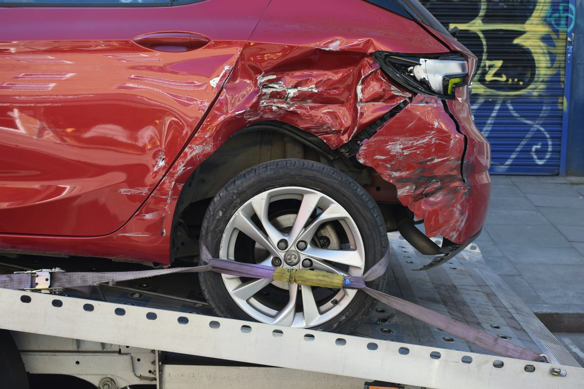 A car with front-end damage, representing a write-off category